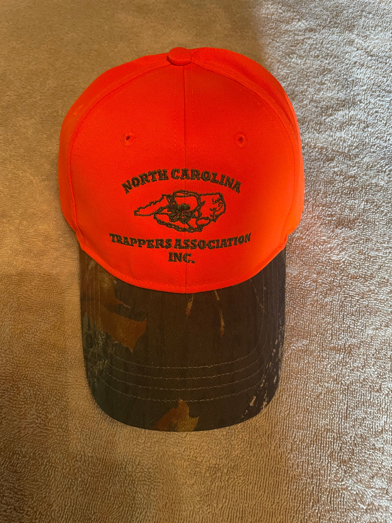 Camo Bill Orange Main Hat - North Carolina Trappers Association, Inc.